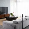 Surround 700 in a room with sofa on a table beside a wall